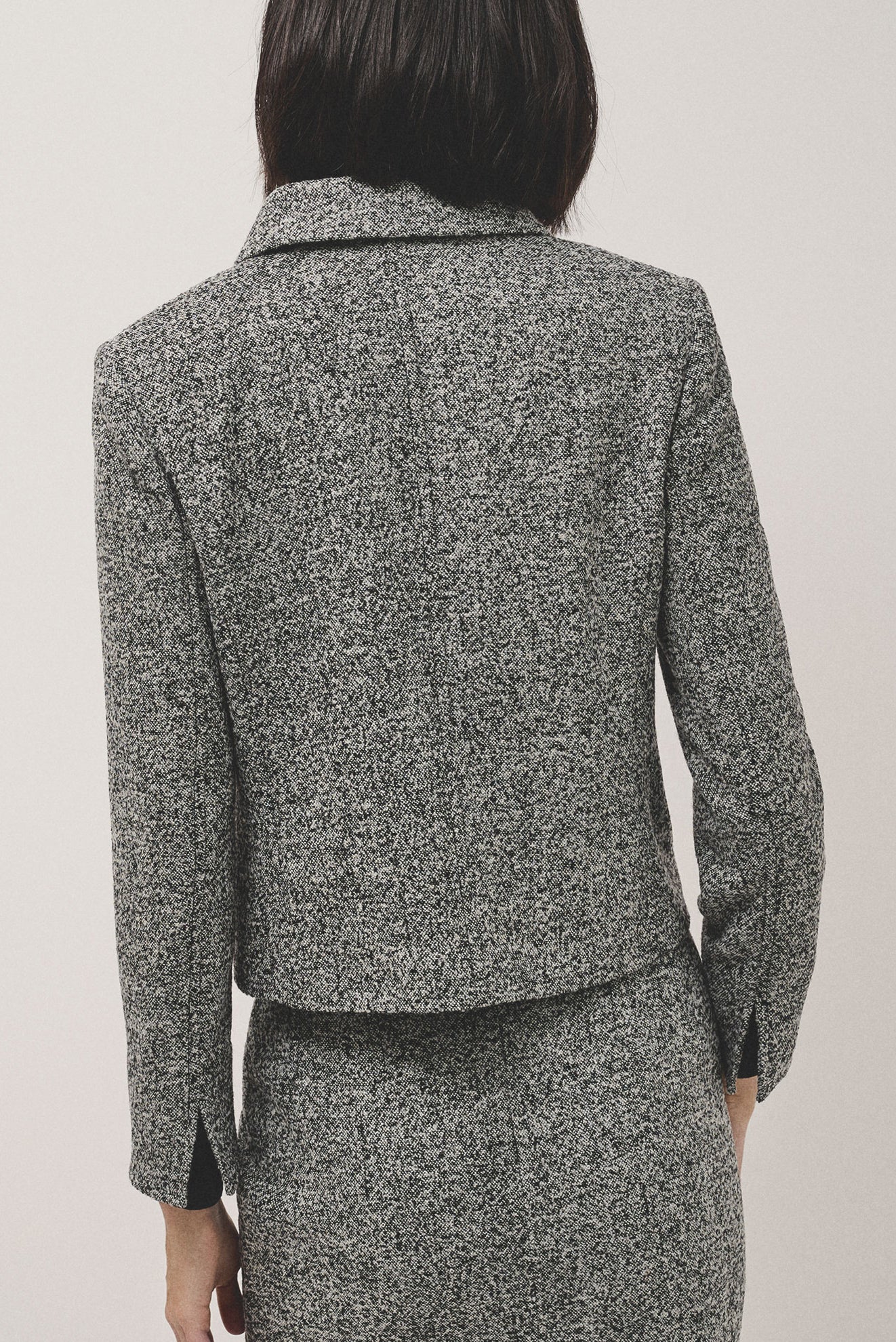 Short black and grey partridge eye jacket