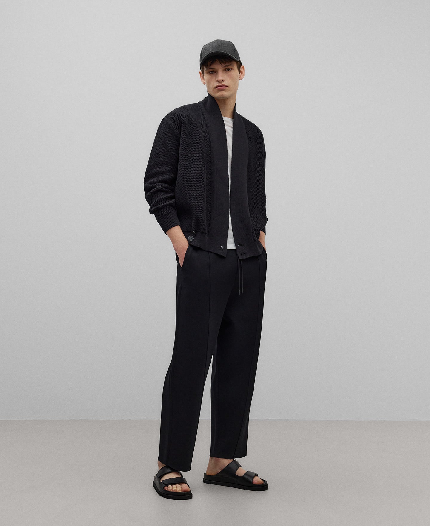 Black knit trousers man in black