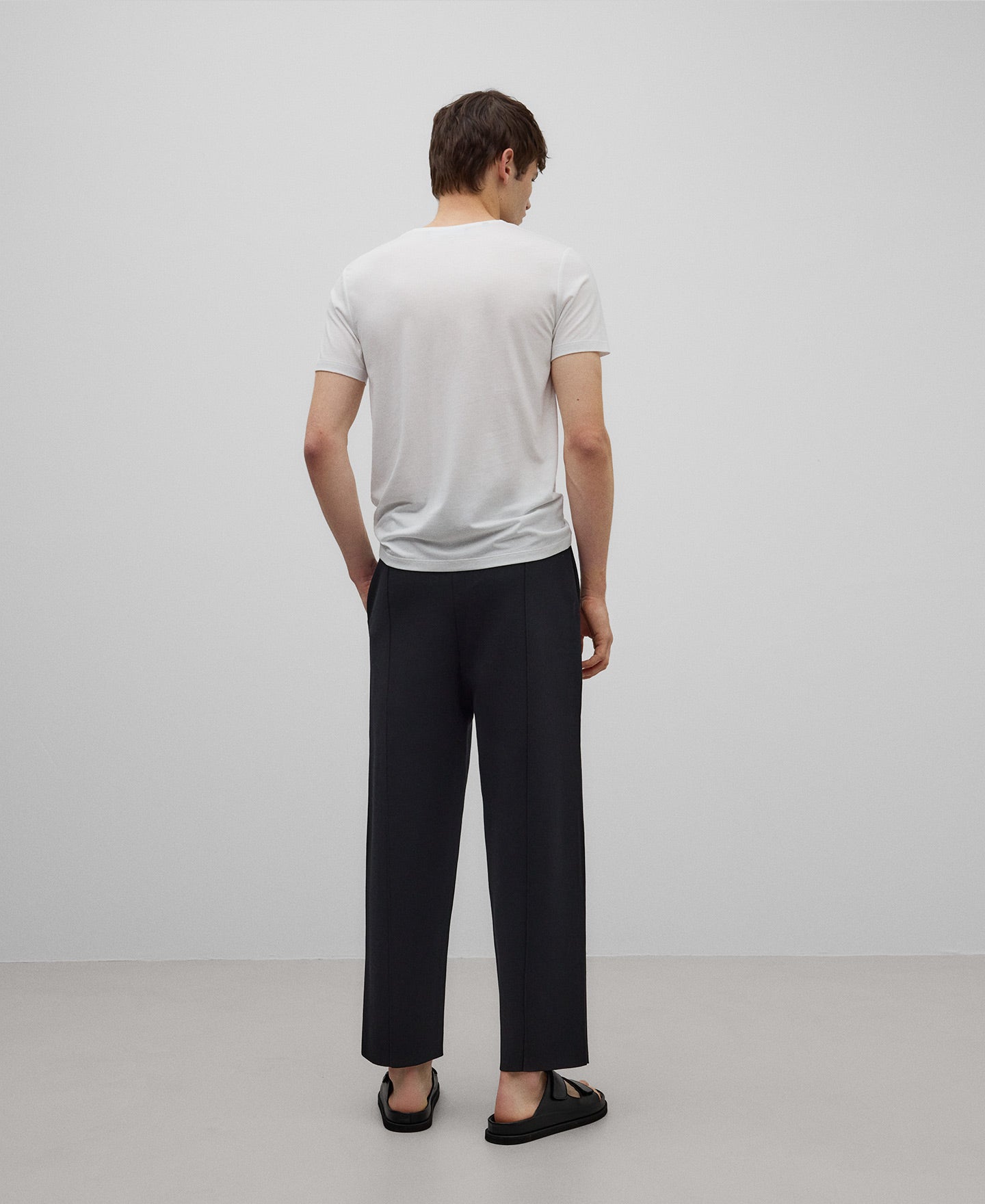 Black knit trousers man in black