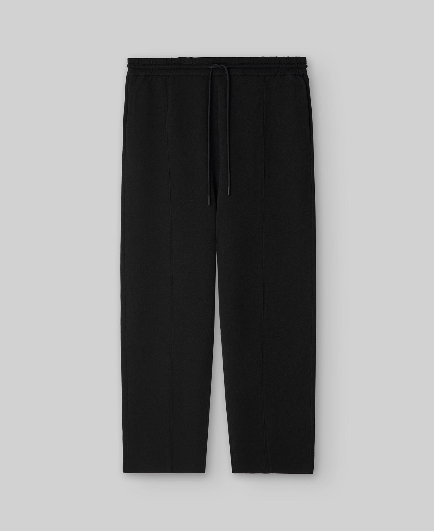 Black knit trousers man in black