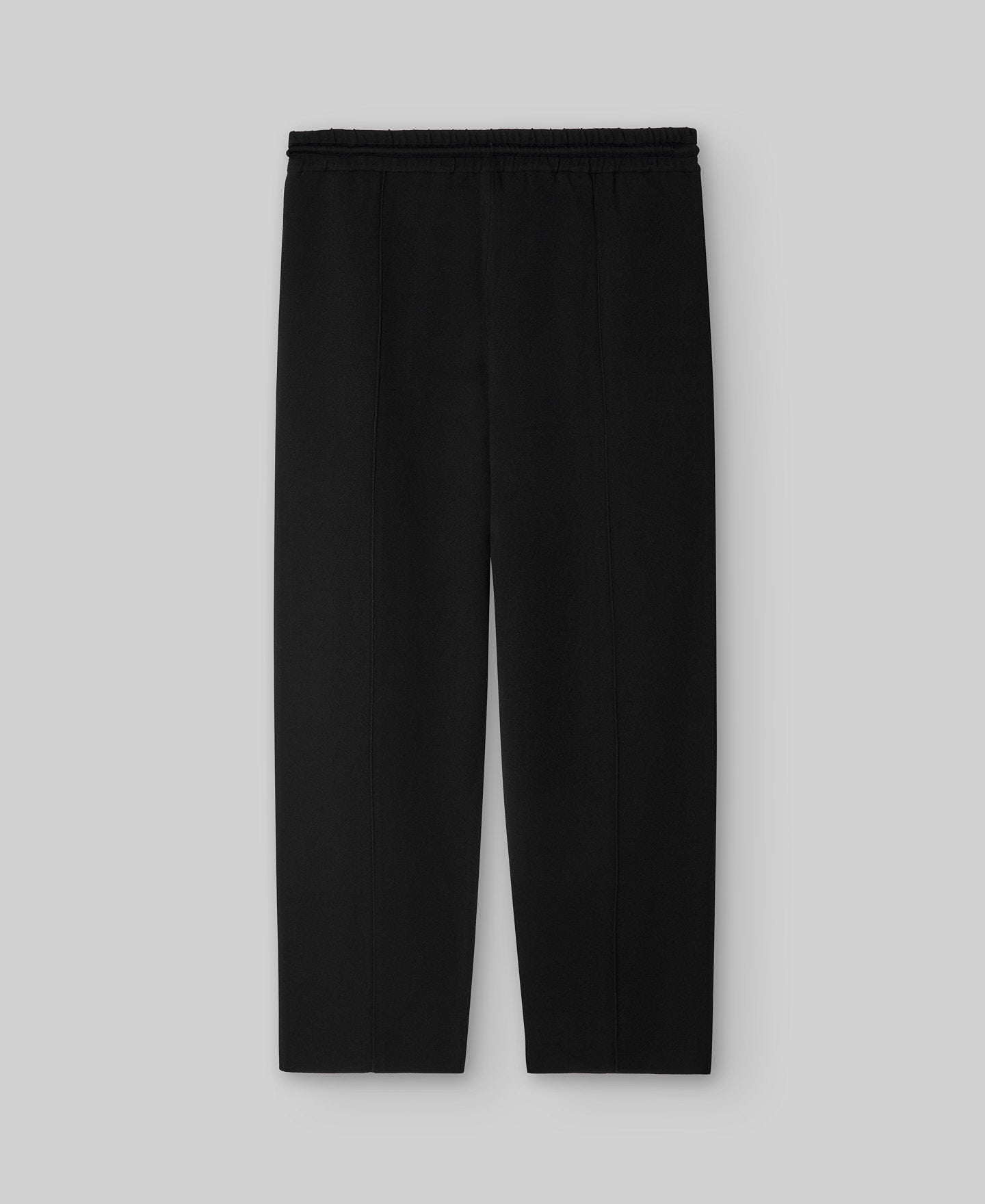 Black knit trousers man in black