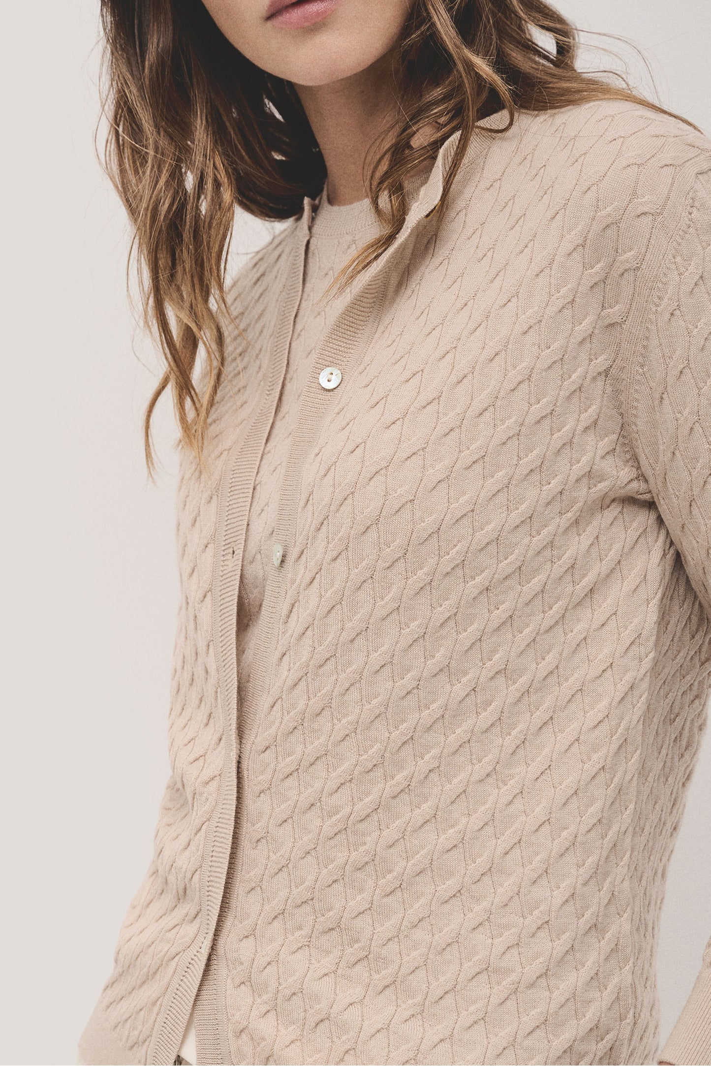 Round neck beige wool knitted cardigan