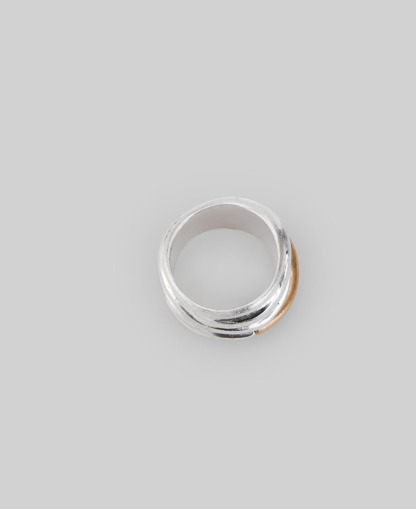 Two-tone tubular metal ring in silver/gold