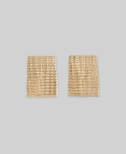 Textured flat earrings woman in gold