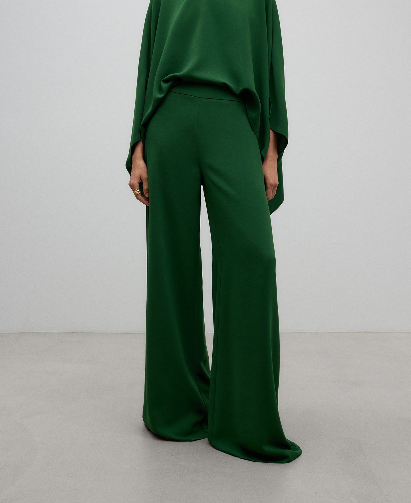 Green wide leg trousers woman in green