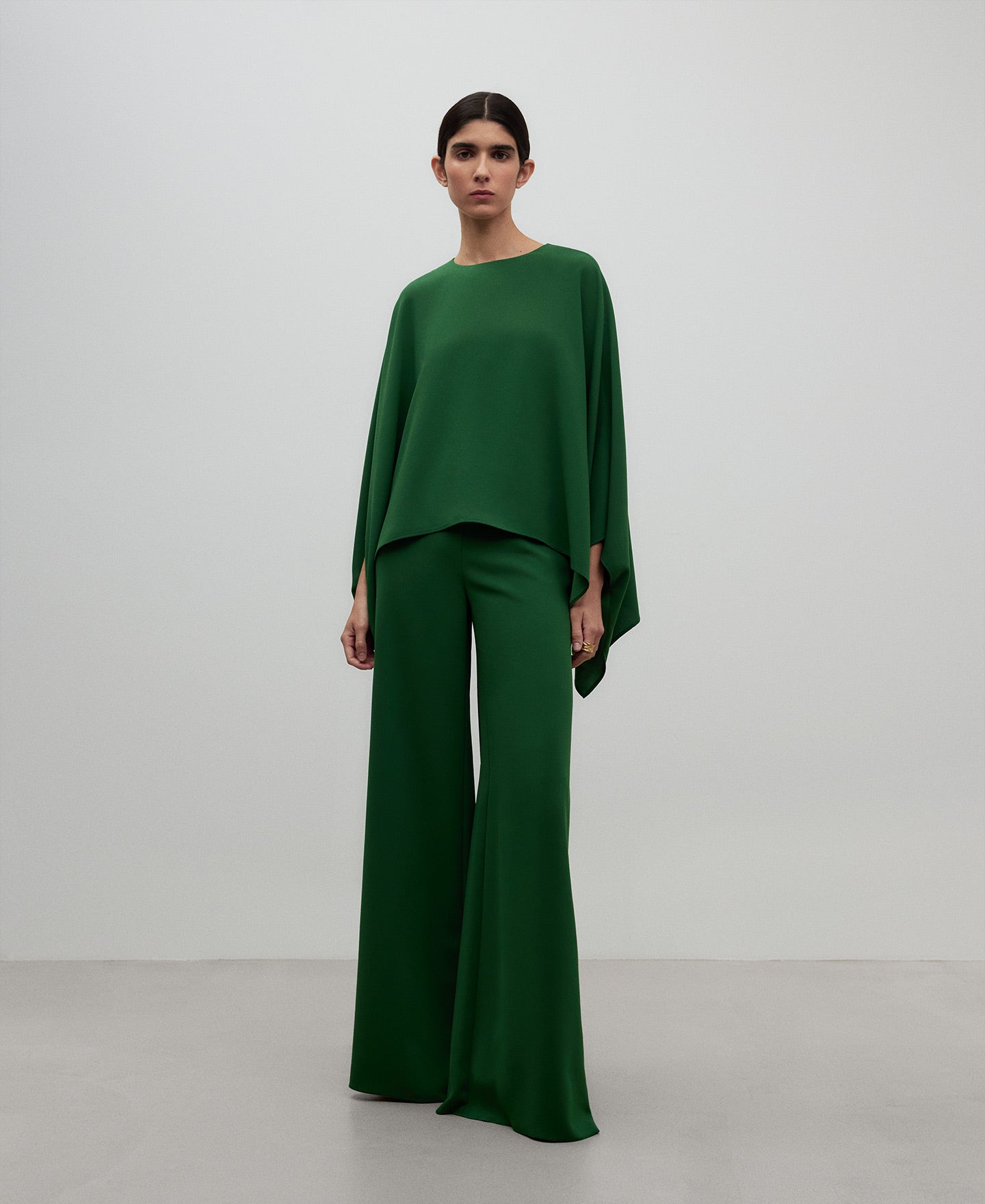 Green wide leg trousers woman in green