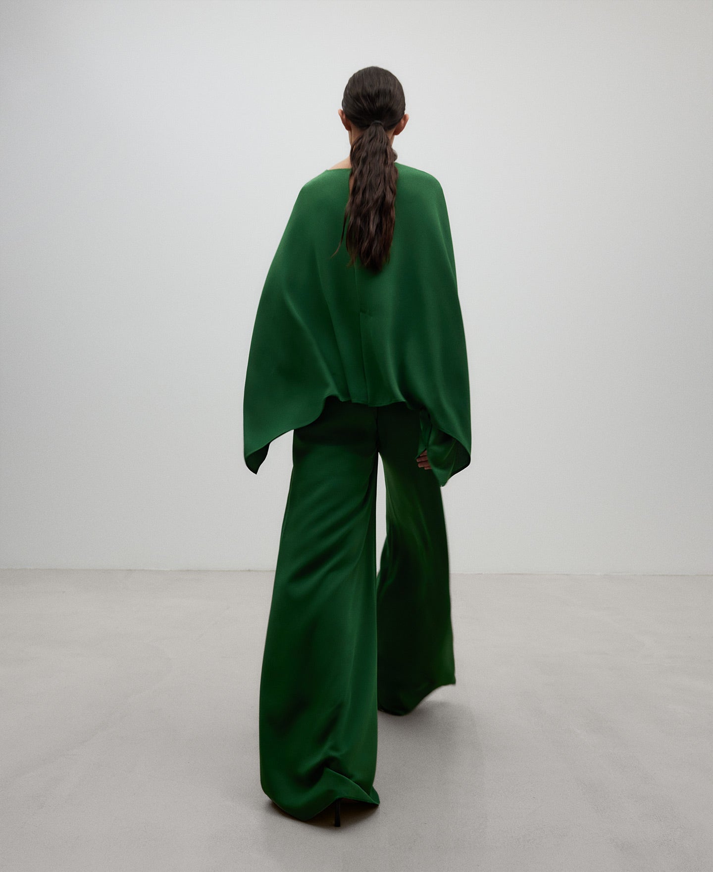 Green wide leg trousers woman in green