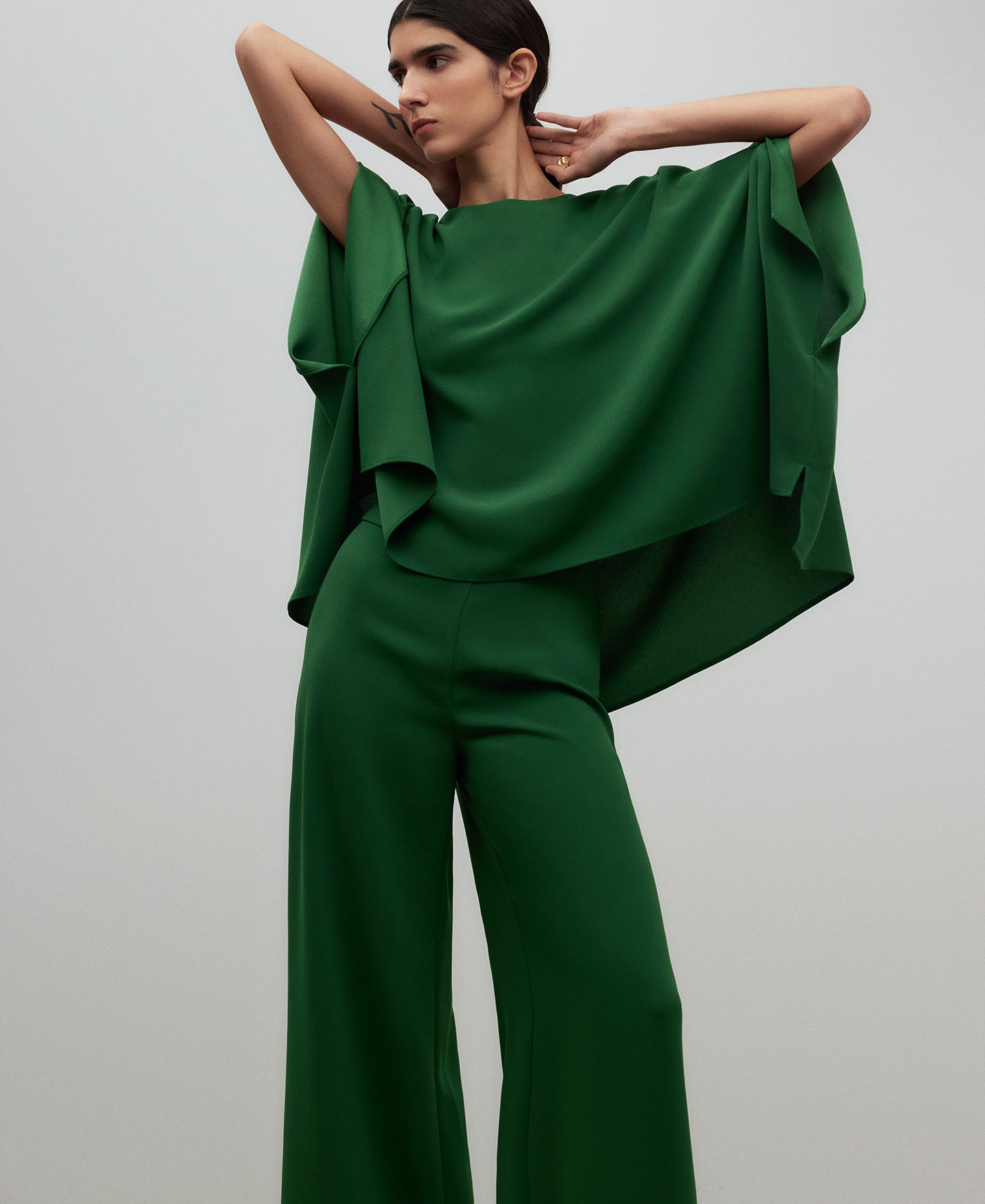 Green wide leg trousers woman in green